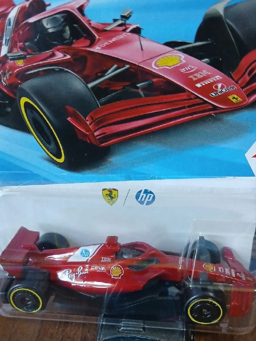 Mattel Hot Wheels Scuderia Ferrari HP in Red with Yellow Wheels